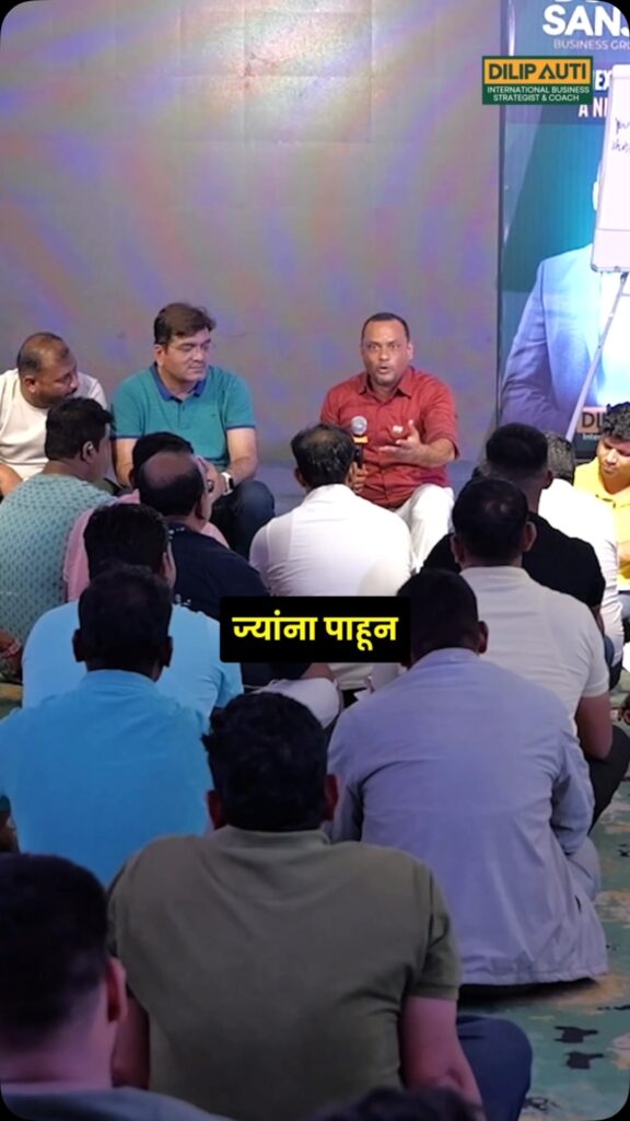 Dilip Auti in a working session with business owners